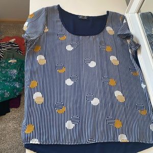 Woman’s dress top. Very good condition.